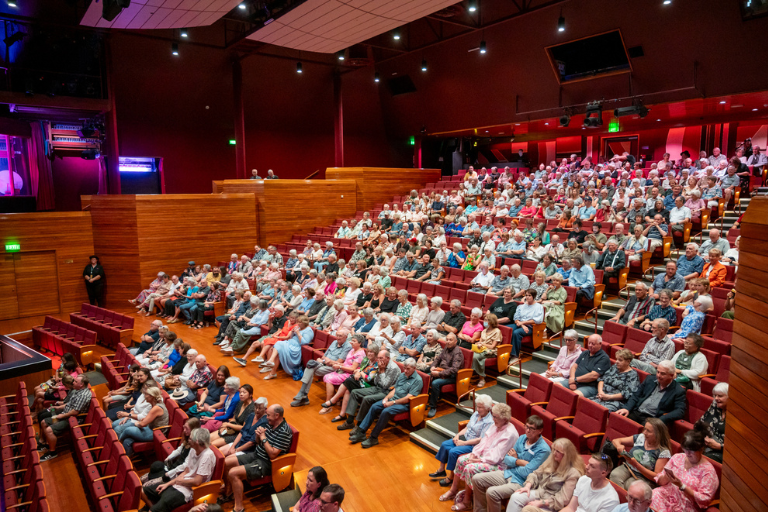 People seated in the Addison Theatre 